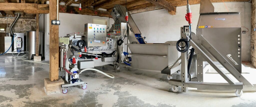 Ligne de pressage pasteurisation et conditionnement de jus de pomme